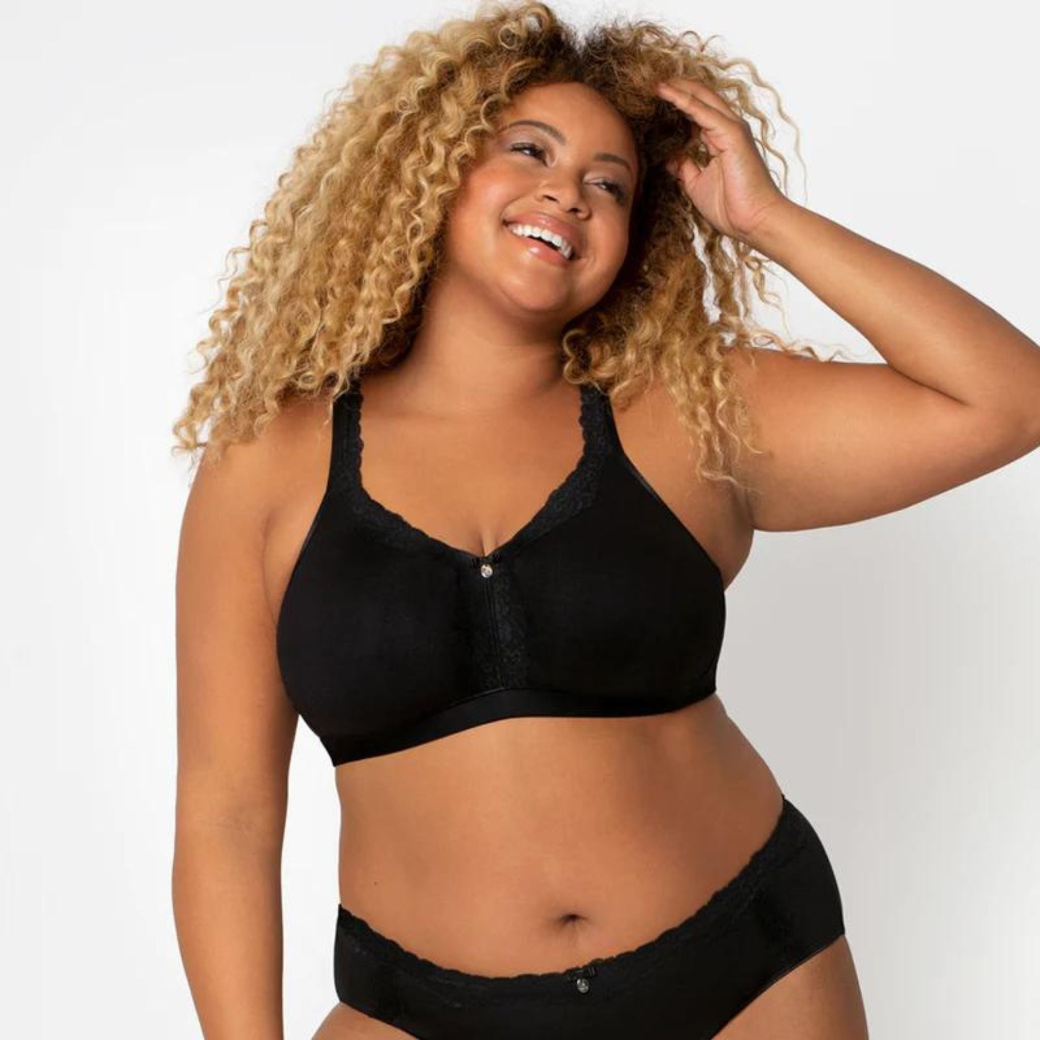 This lace trimmed bralette introduces a cotton blend bra with all the benefits you know and love! Molded, wire-free cups, soft cushioned bottom band and a comfy compression fit with an unexpected lift for all-day support. Naturally breathable moisture-wicking fabrics keep you cool and dry Double-lined cups for a shapely unexpected lift Eliminated back bulge with wide, smooth back wings