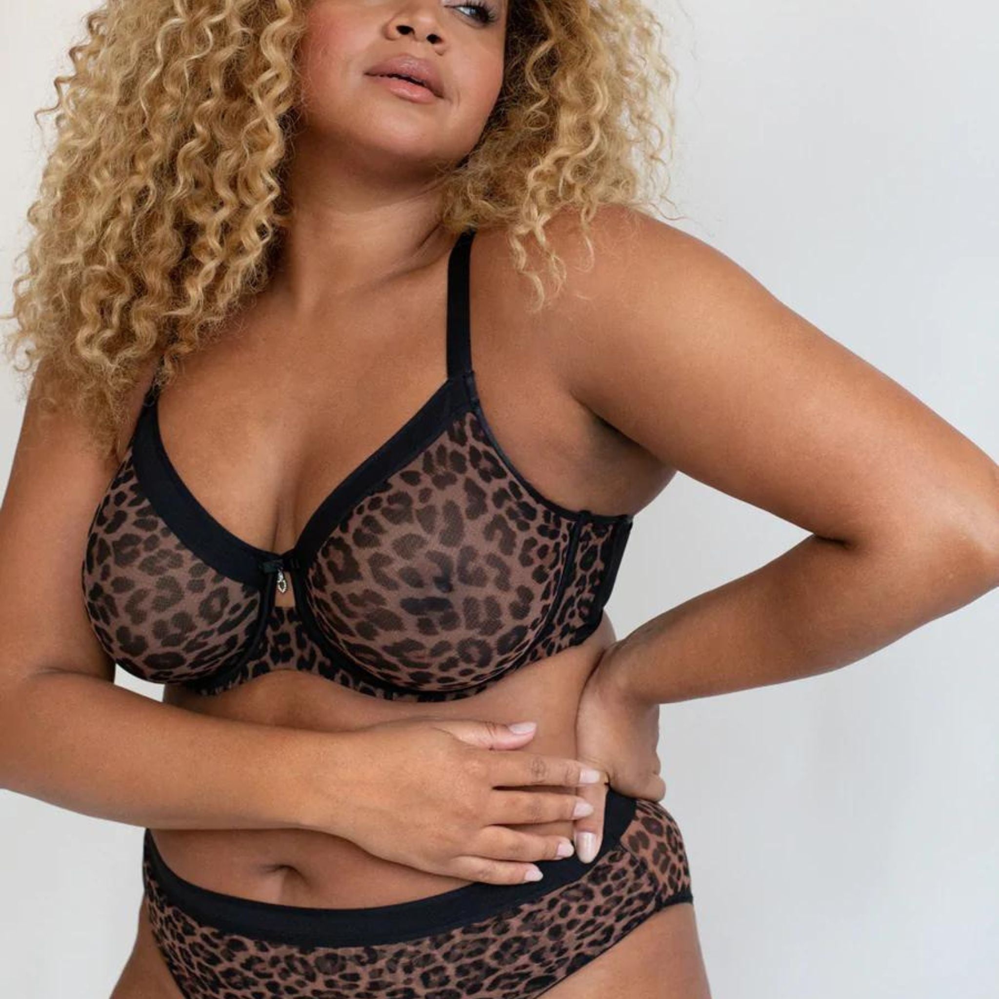 This sheer mesh style is an everyday bra with two layers of sheer mesh molded cups. A plunging stretch neckline detail offers perfect contoured coverage. It’s a great option for the full-figured woman who likes a natural bust shape. The exceptional fit & support you know and love from Curvy Couture, this plus size sheer unlined bra gives you sexy & comfort all in one! Sheer see-through unlined cups with two layers of mesh.