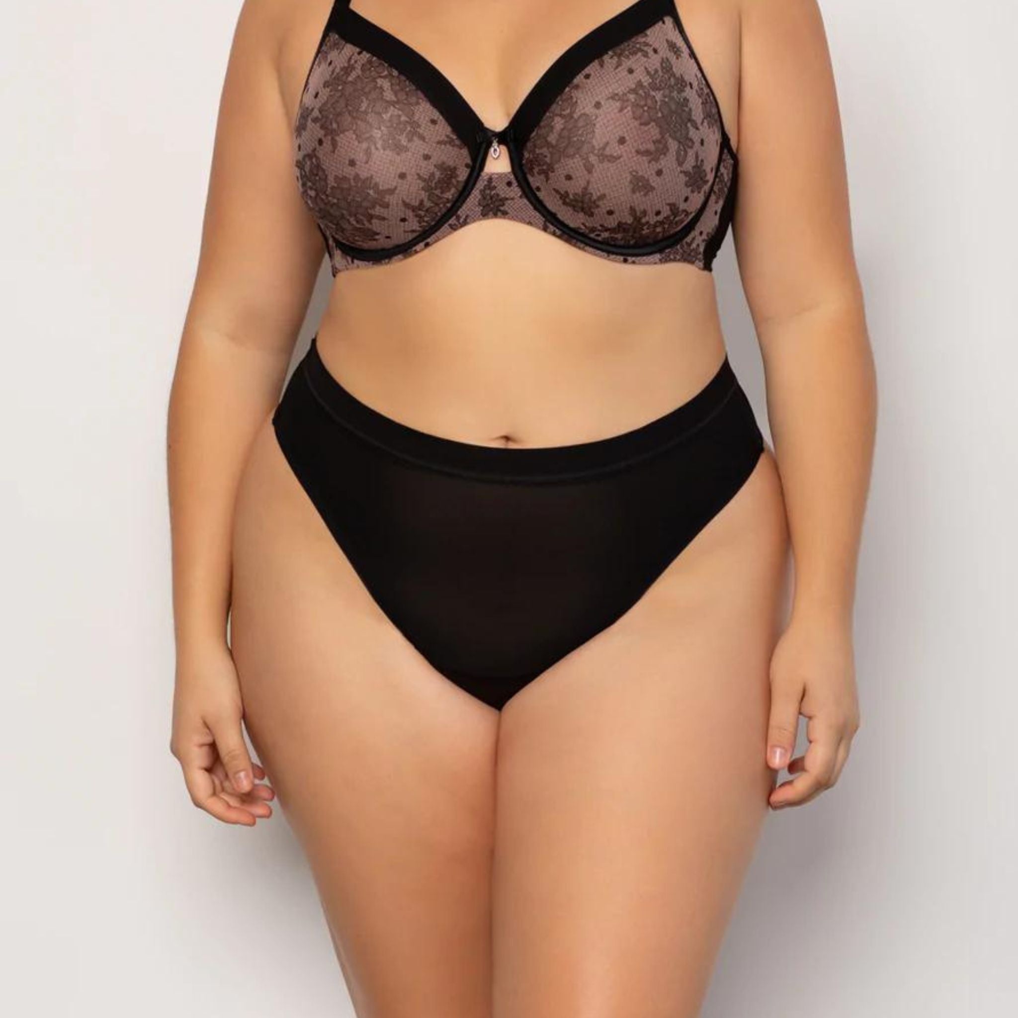 Curvy Couture's best-selling mesh collection now offers a thong. The stretch mesh thong is effortlessly sexy with ultimate comfort. A top drawer essential and perfect under any outfit. · High cut leg opening · Sleek and soft with breathable, airy mesh fabric · Medium rise sits below the belly button · Ultra-breathable with sheer mesh stretch fabric · Panties have a cotton lined gusset for comfort · No VPL! Invisible panty lines, every time