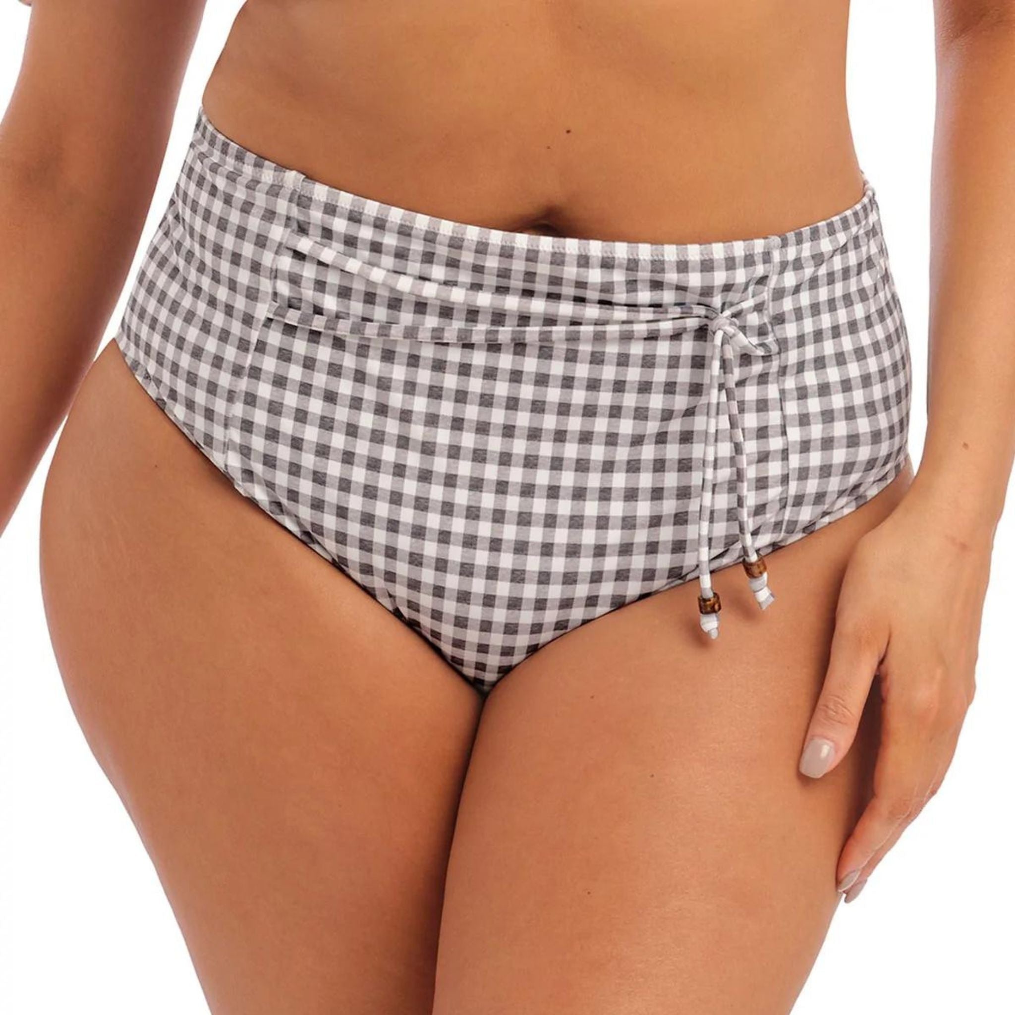 Covered elastic waistband provides a close fit. Soft microfibre features a checker pattern. Elastic bands are sewn onto right front seam and tie at left loop. Bands have faux tortoiseshell end beads. Seamless rear. High rise. Moderate, "cheeky" rear coverage. Fabric care tag is sewn-in at inner waist. Fully lined, with no additional lining at crotch.