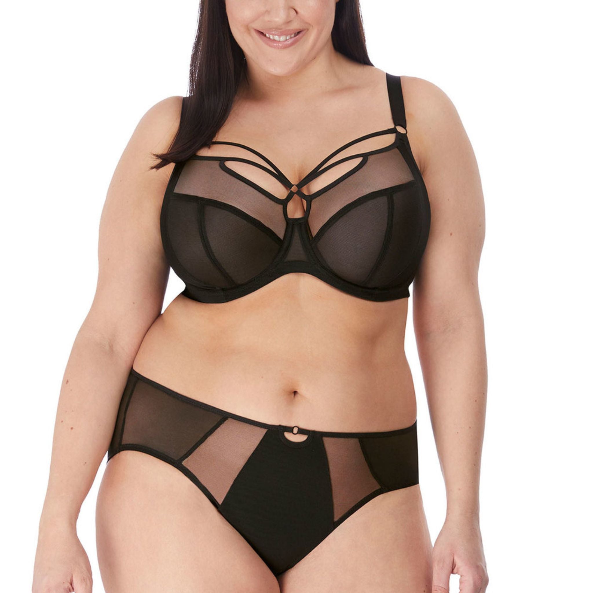 Simple yet striking, Sachi takes centre-stage with the Plunge Bra in a signature Black colourway. The bra showcases sheer and solid panelling with on-trend strap detailing, designed to be seen and emphasise cleavage. A three piece cup offers forward shape and uplift in cup sizes DD - JJ.