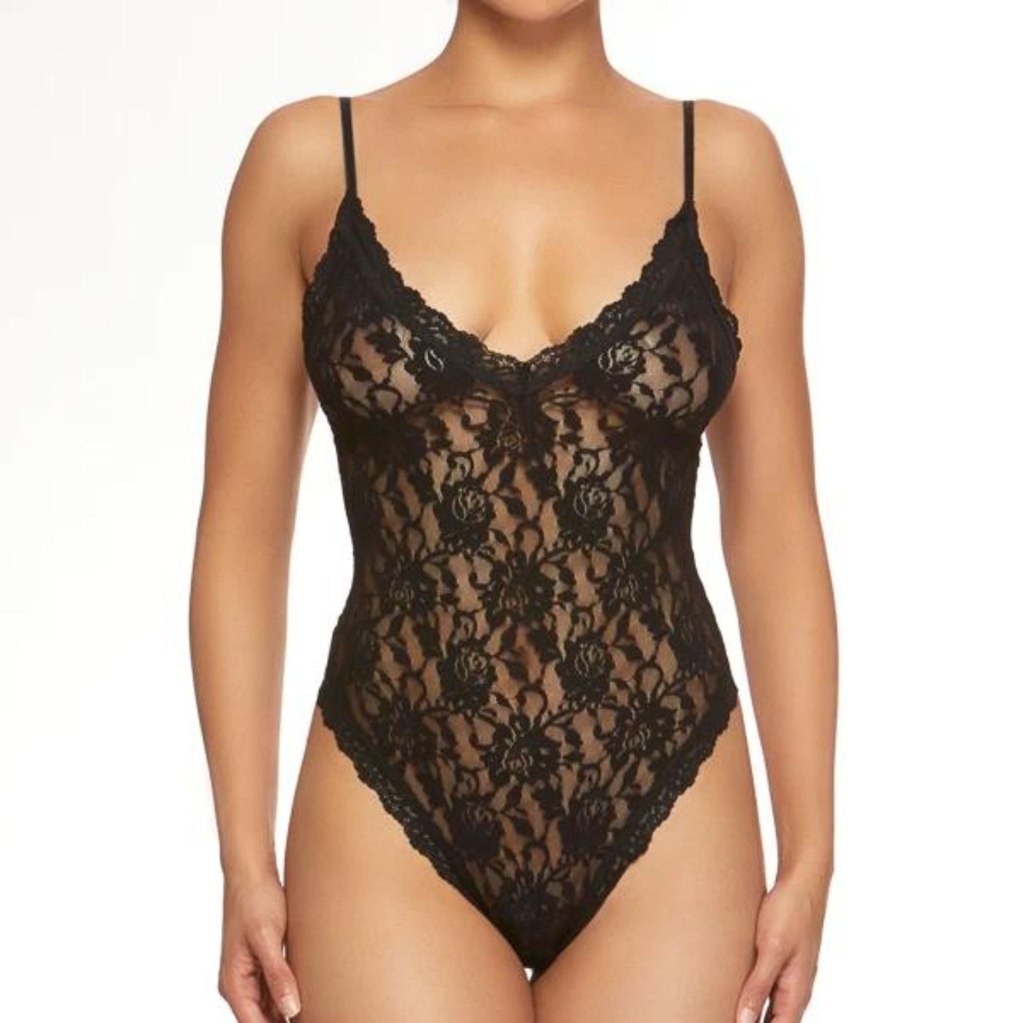 ne piece wonder! Soft signature lace v-neck bodysuit Perfect for layering or as a sexy bedroom piece Scalloped lace trim at neck and leg. Trendy high-cut leg• Thong back Adjustable Straps No closure, step into it like a bathing suit Body: 100% Nylon; Crotch lining 100% Supima® Cotton; Exclusive of trim.