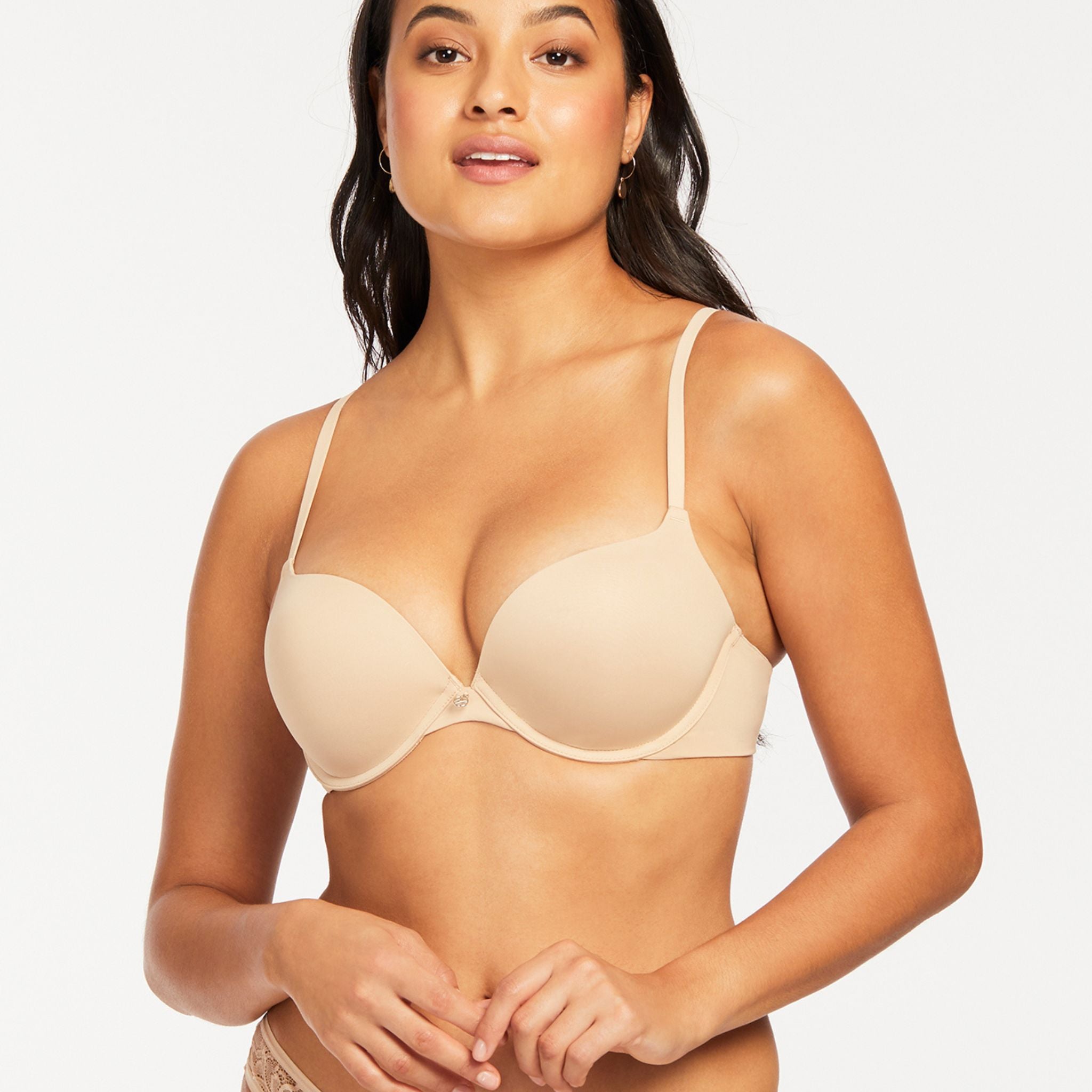 The Allure light push-up bra will give your cleavage and confidence a gentle boost, day or night. With gradual padding that decreases with increasing cup size, your cup will never runneth over! The convertible multi-channel straps mean you style the straps classic, crisscross or halter - perfect under a plunging halter sundress or to give that plain boardroom button-down a sexy twist.