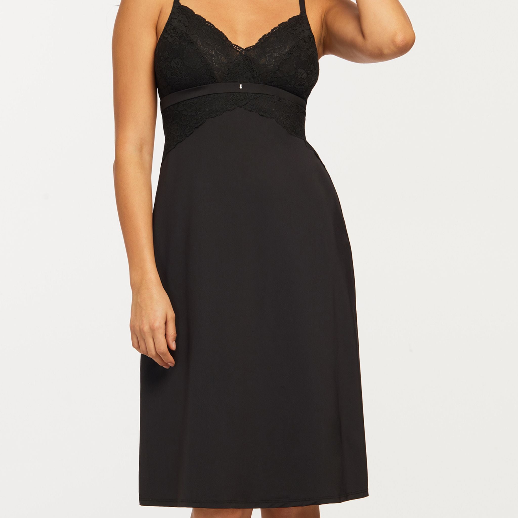 A longer version of Montelle's bestselling chemise, embrace style, sensuality and peaceful sleep every time you slip into this flattering gown. The ultra-soft microfiber fabric sits gently against your skin while the lined bust and its floral galloon lace enhances your natural shape and provides support. To embody grace and comfort, look no further.