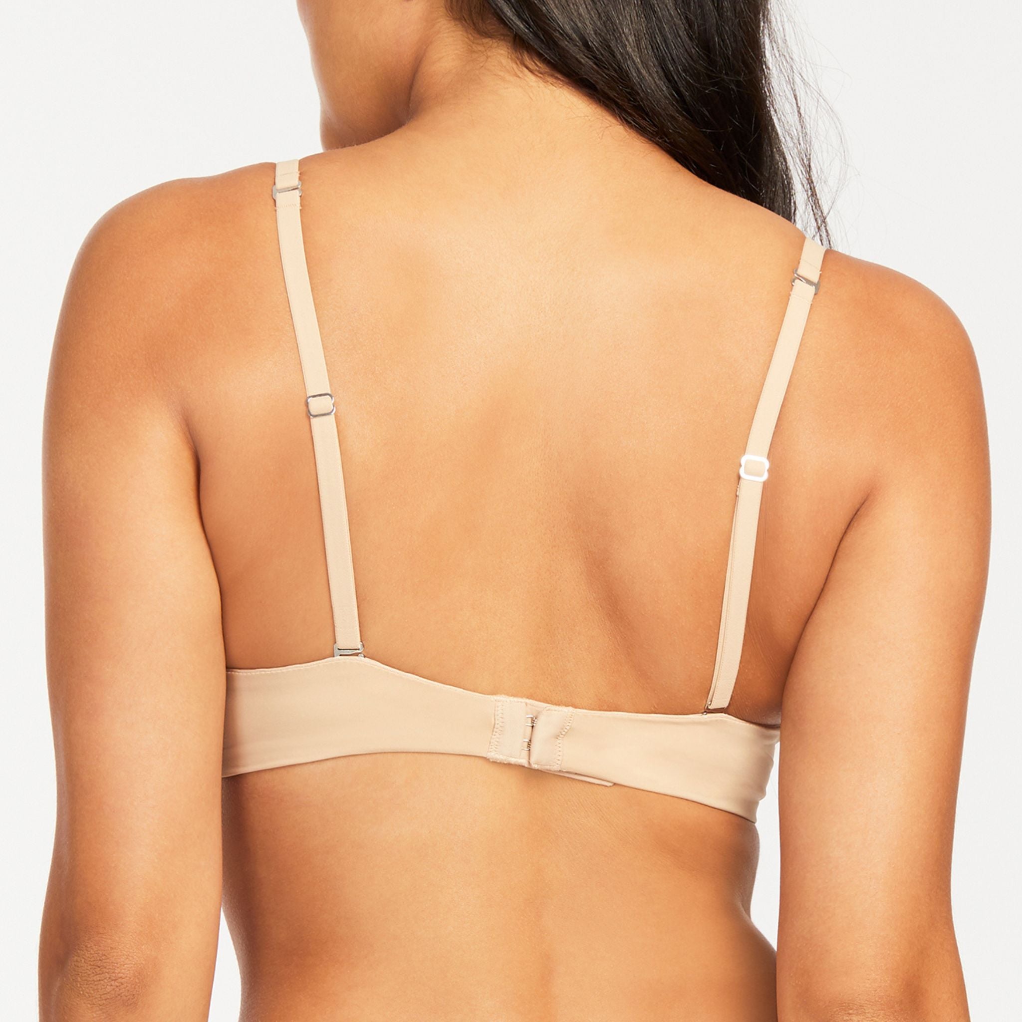 The ultimate wireless bra, the Wire-Free offers you all the support and body-hugging comfort you want in a T-shirt bra. Made with our signature ultra-soft microfiber, this customer favorite features soft molded foam cups and multi-position convertible straps that can be worn classic, halter or crisscross. Style with your favorite v-neck or lower neckline tops and dresses and don’t leave home without it - it’s the only one you’ll need to pack on a casual weekend getaw