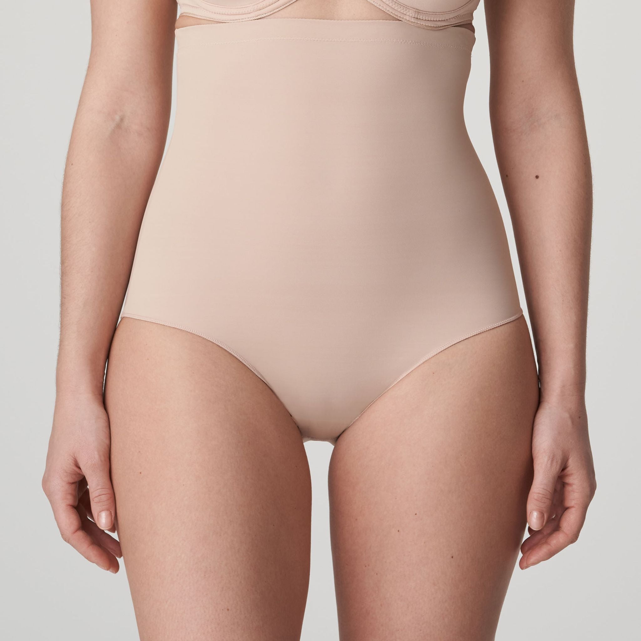 Perle high waist control briefs in supportive microfibre, worn just below the bra.