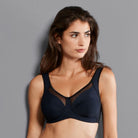 Reaching an all-time high in feminine elegance, the CLARA ART wireless bra offers a unique approach to firm support. The three section cups which beautifully run into the straps and are framed by a side shaping panel which ensures a secure silky-smooth fit. The wide comfort straps with stabilizing padding in the shoulder area and the functional back become wider in the larger sizes. The lower cups are lined with an oval print knit fabric with semitransparent panels in the upper cup.