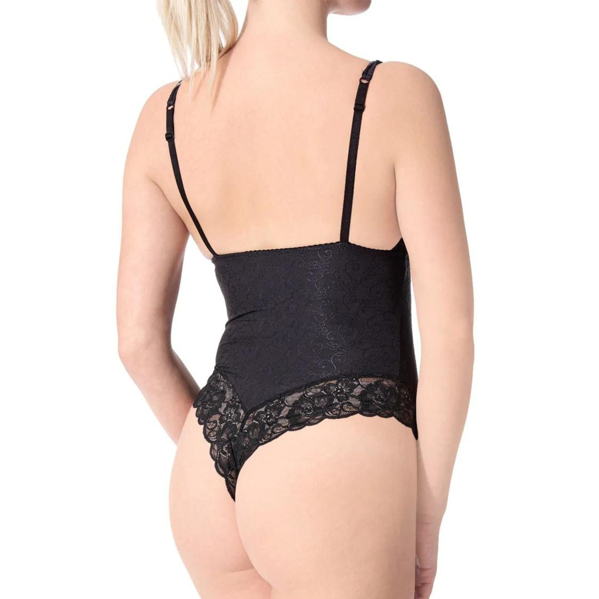 Let yourself be seduces by this simply elegant lace bodysuit. Featuring a v neckline, adjustable shoulder straps, lace cups, a cheeky thong cut and a snap closure cotton gusset. Top and edges made in a delicate floral lace. Body made in a smooth, stretch micro nylon jacquard.  Fabric: 87% Nylon 13% Elastane  Machine wash. Delicate cycle. Hang to dry.  Made in Canada