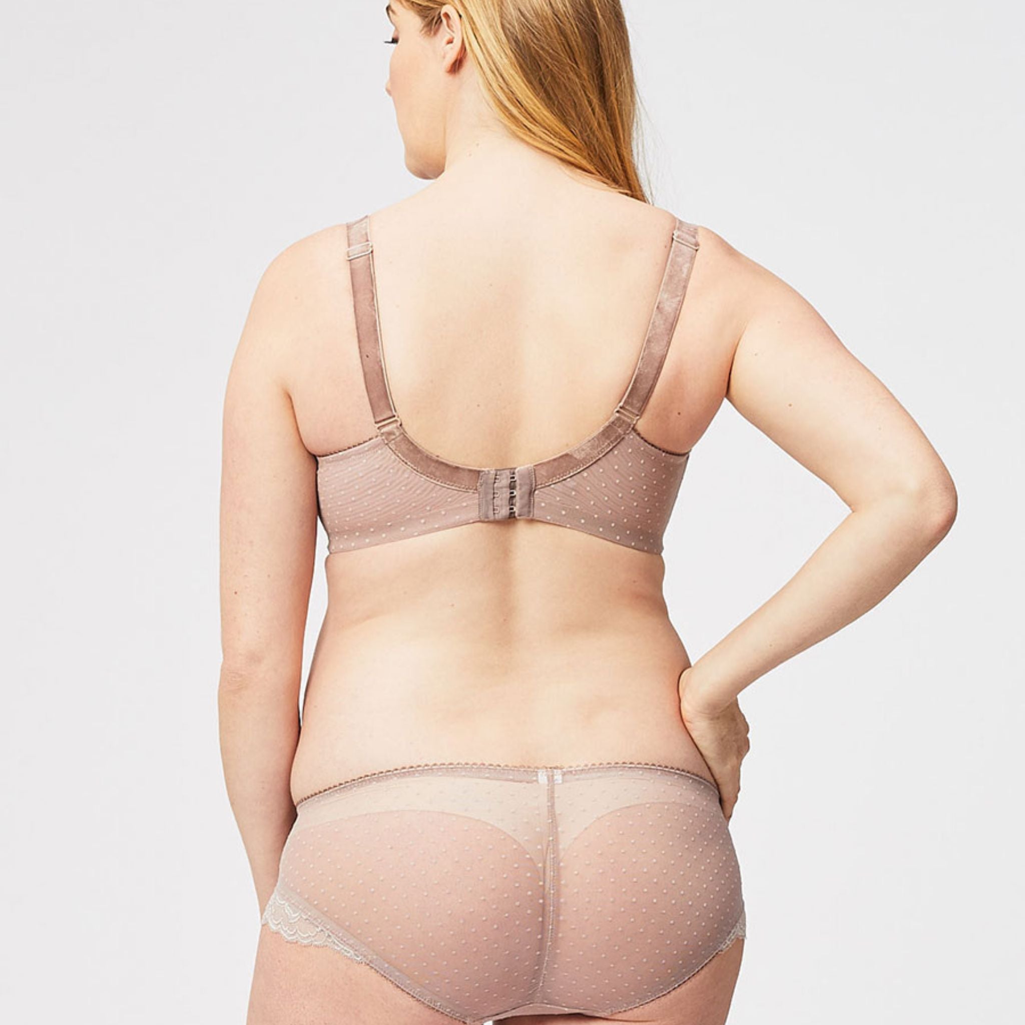TimTams is the perfect work or evening bra that delivers the perfect mix of sophistication and versatility! This flexible wire lace top cup and spot mesh body is the perfect all day bra for women who desire a shapely profile! A rounded balconette shape bra with lower centre front. Featuring cotton-lined cups, wider short stretch velvet straps for comfort, laced edge stretch in the cup for growth and a superior lift, this bra will boost your confidence and bust line!