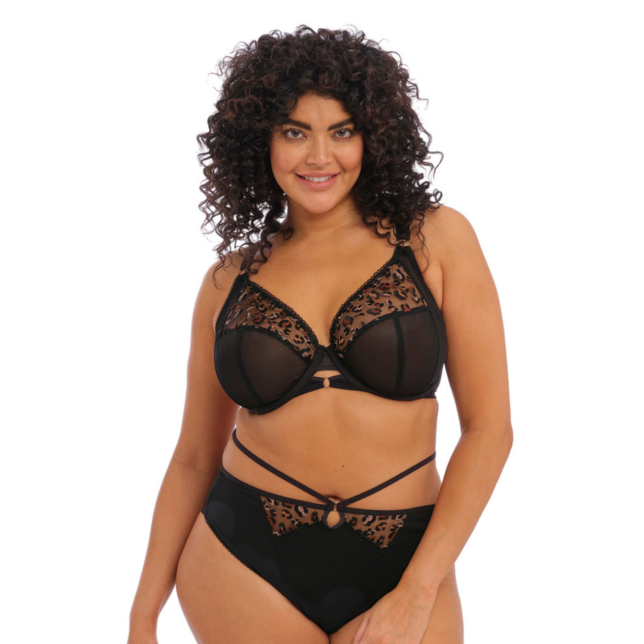 Uncover Elomi's Namrah Bandless Plunge Bra in Black! Based on the beloved Matilda Plunge Bra frame, but with the front cradle removed from under the cups, for a contemporary twist and a lighter look and feel. The dual-toned animal-print embroidery, paired with the mesh panelling along the top cups, also creates a beautiful shimmering design.