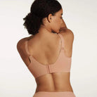 The Beyond Bra by Evelyn & Bobbie is one of the best wireless, adjustable bra on the market. Features adjustable comfort straps and a hook and eye closure on the back band that flexes to move with your body. Designed by women, crafted to support bigger busts. Fits up to a J cup! Seamless lift & separation, that supports like an underwire bra yet feels weightless on your body.