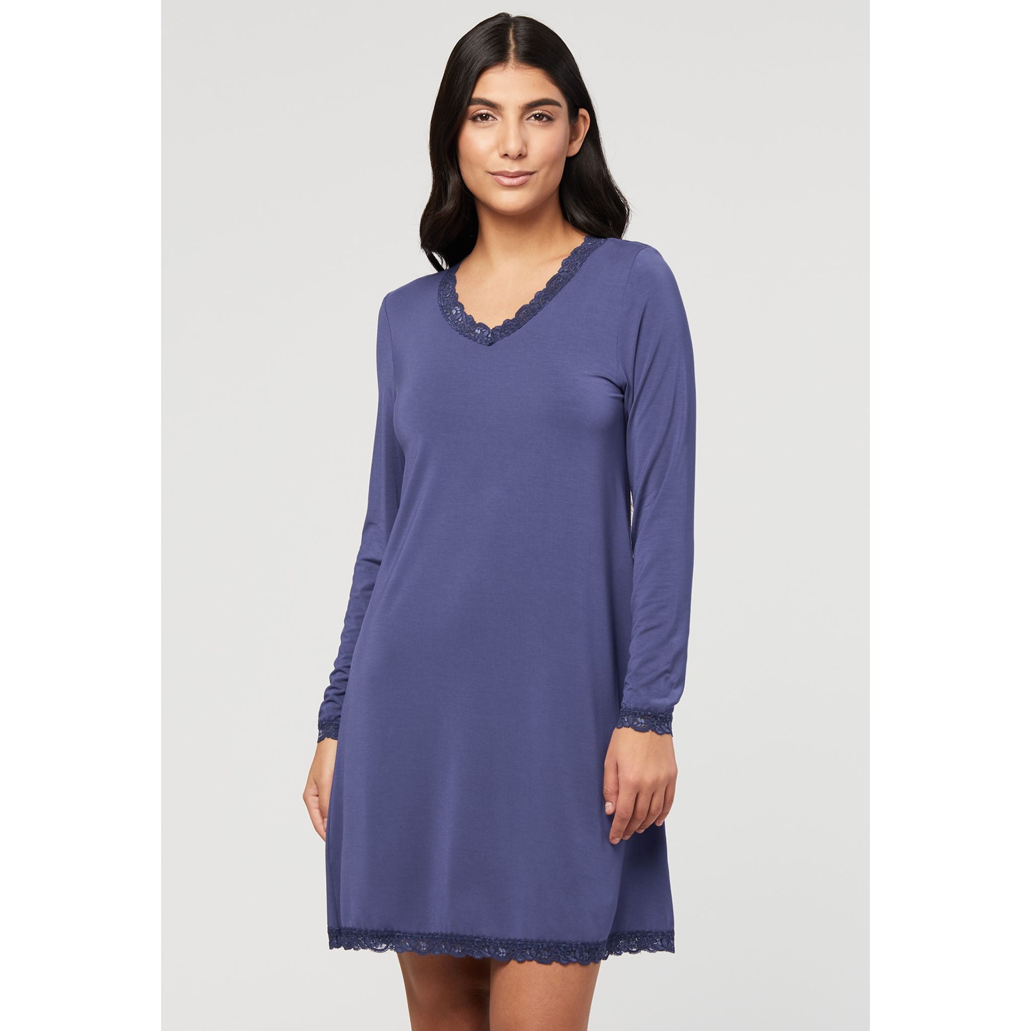 Stay cozy and look like a dream in this Modest Nightshirt, made with cloud-soft, eco-friendly TENCEL™ Modal. The style is loose fitted for your comfort and features sweet lace accents along the hemline, neckline and around the wrists for that little something sweet.