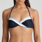 Stylish bikini top with diagonal stripes and sophisticated pleats on the cups. This cache-coeur inspired top features elegant draping. Wear the straps straight over the shoulders or around the neck. Cloud Party is a playful combination of fresh, intertwining shades of blue that make it dynamic and fun.