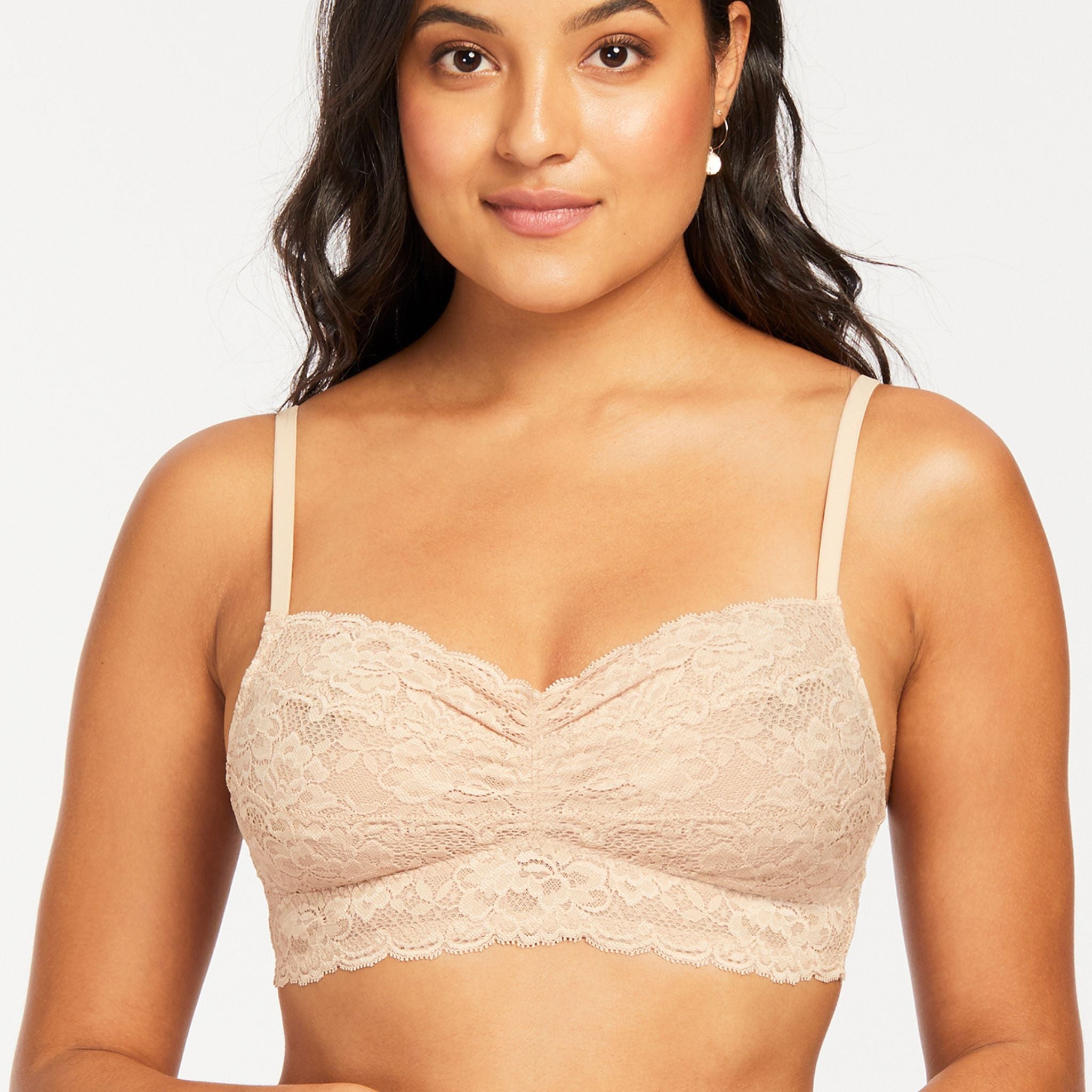 Finally, a bralette designed for fuller cup sizes! Sized like a bra with band and cup sizes, the lace Bralette was designed to support women with larger busts and smaller backs. Wire-free and made with smooth floral lace, this bralette also features convertible straps that can be styled classic or crisscross to complement your look for the day.