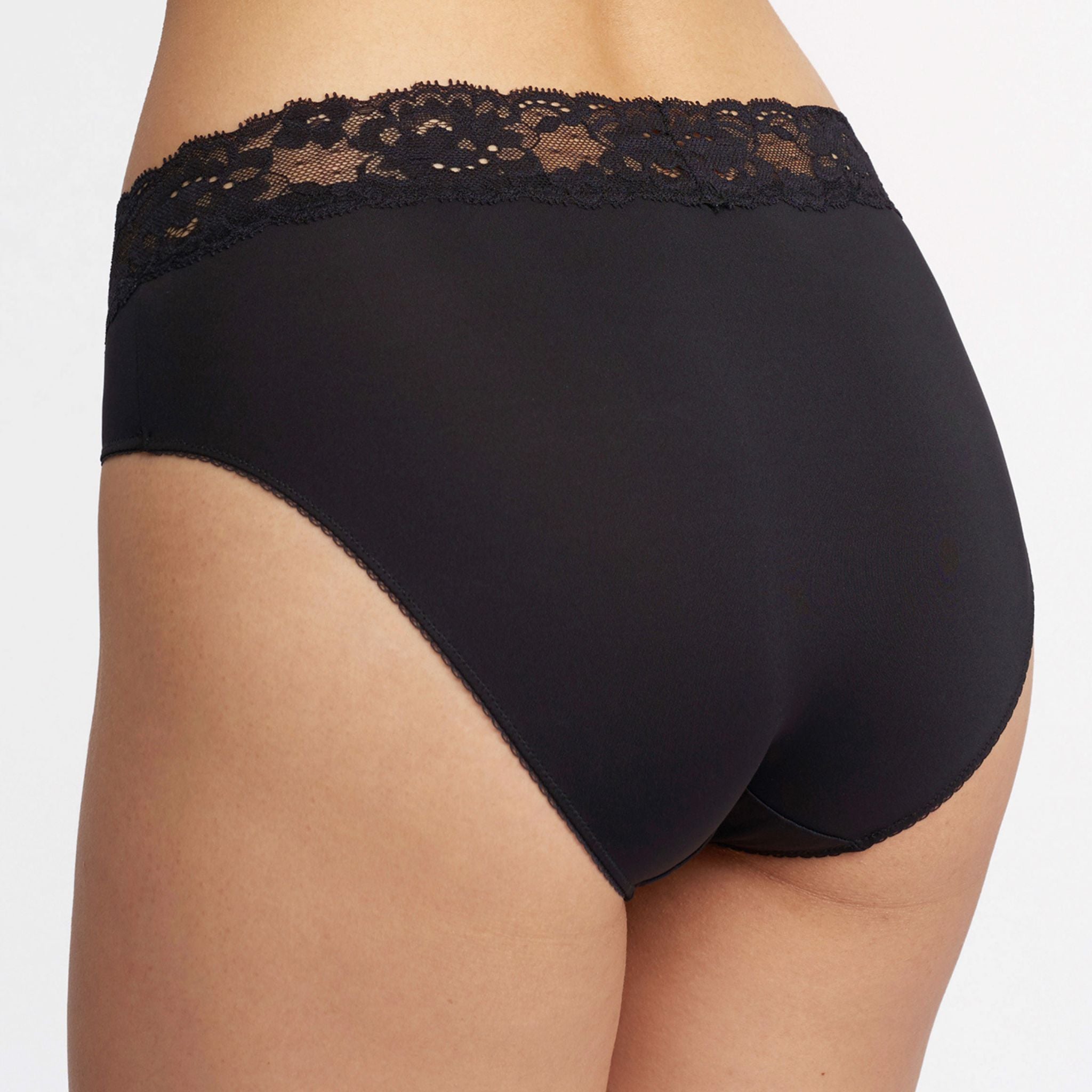 This panty has you covered! Made with ultra-soft, lightweight microfiber, the Brief has full coverage at the back and flat elastic around the legs and at the top for a line-free look.