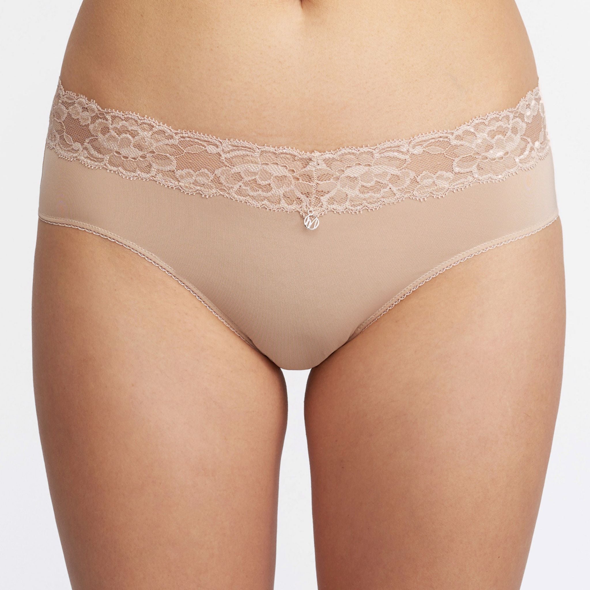 This panty has you covered! Made with ultra-soft, lightweight microfiber, the Brief has full coverage at the back and flat elastic around the legs and at the top for a line-free look.
