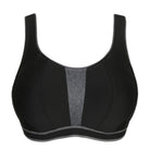 Sports bra with underwire and a hip sweater look. It is made from a soft breathing jersey fabric. The straps can be worn over the shoulder or round the neck. The brightly coloured fabric between the cups and fluorescent piping complete your trendy athletic look.