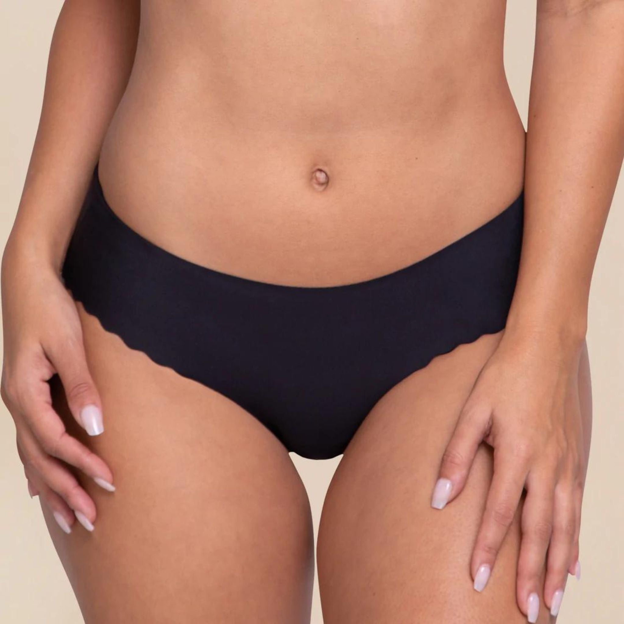 The Everyday Undie provides invisible protection and is made with breathable microfiber to eliminate panty lines. Created with delicate, scalloped edges, these undies are so comfy they feel like a second skin!