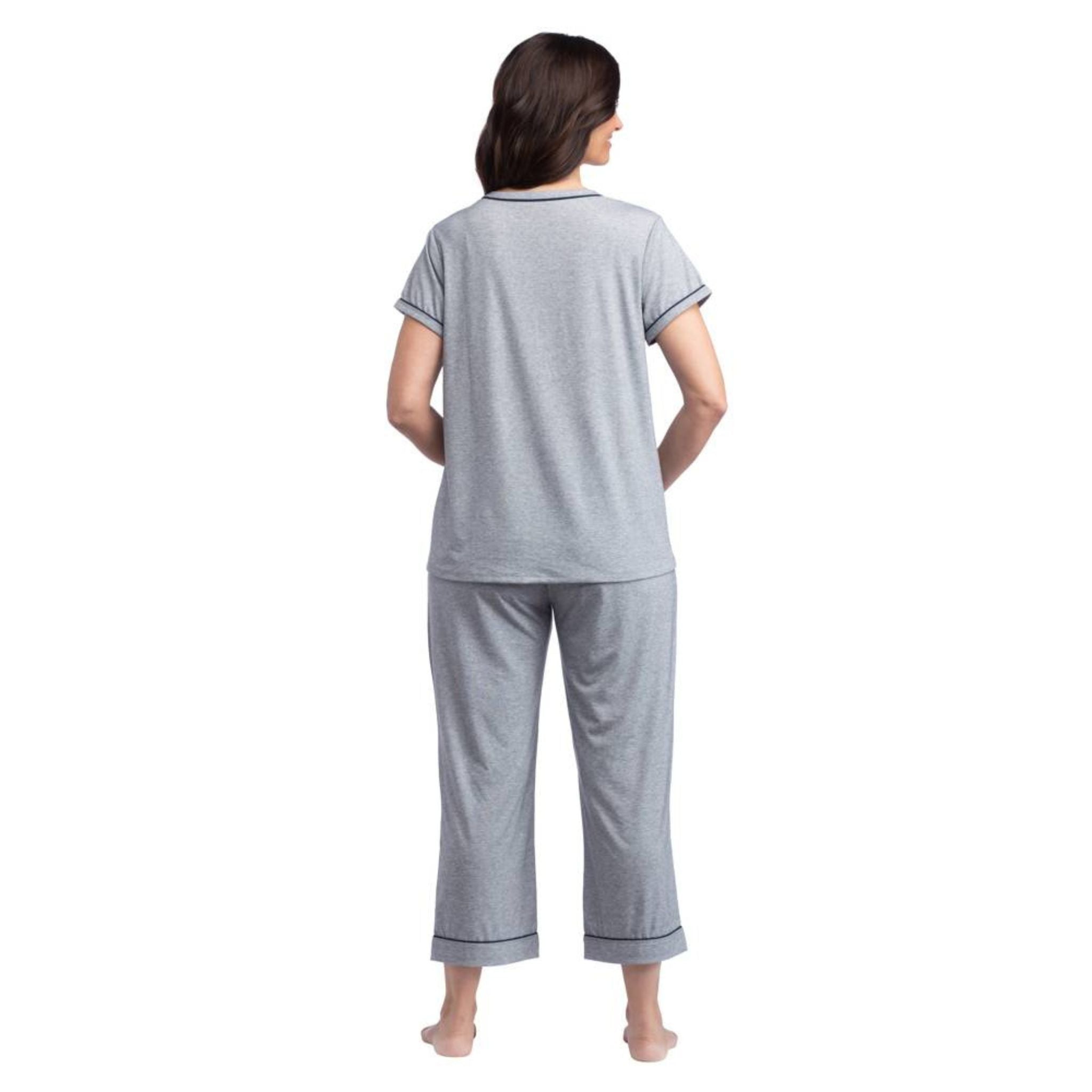 Meet your new 24/7 loungewear and sleepwear favorite — Softies Cali Short-Sleeve Capri PJ Set with Colored Trim. This is the perfect pair for those stay-in-your-PJs days. Ultra-inviting and exceptionally lightweight, you’ll feel cozy and stylish in this set, thanks to contrast trim accents that decorate the shirt and pants. An elastic waistband with an adjustable drawstring tie allows for a customizable fit.