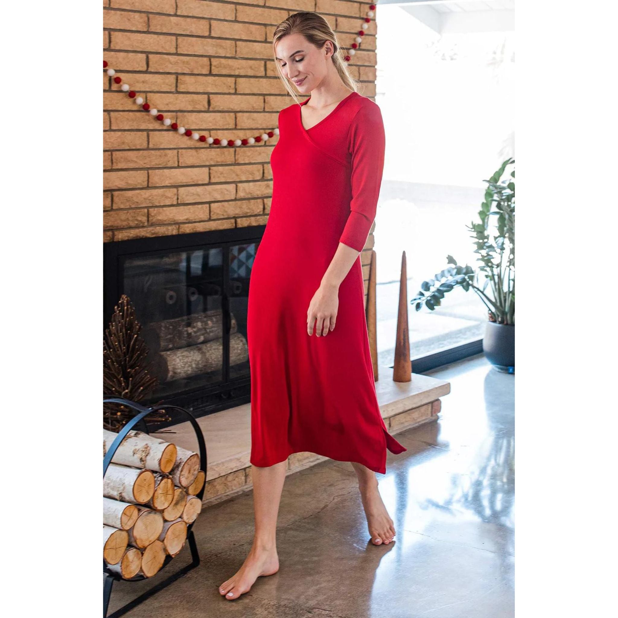 Pamper your skin while you sleep in the Haley Gown, which provides moderate coverage for cooler nights. Side slits, crossover front detail, 3/4 sleeves. Below knee hemline.  Like a second skin, Yala's organically grown bamboo viscose jersey provides incredible softness, breathability, and sun protection. 95% Viscose from Bamboo | 5% Spandex Sewn Where Sourced on Small Sewing Floors Low Impact Dyes Oeko-Tex 100 Certified Naturally up to UPF 50 (Ultraviolet Protection Factor)