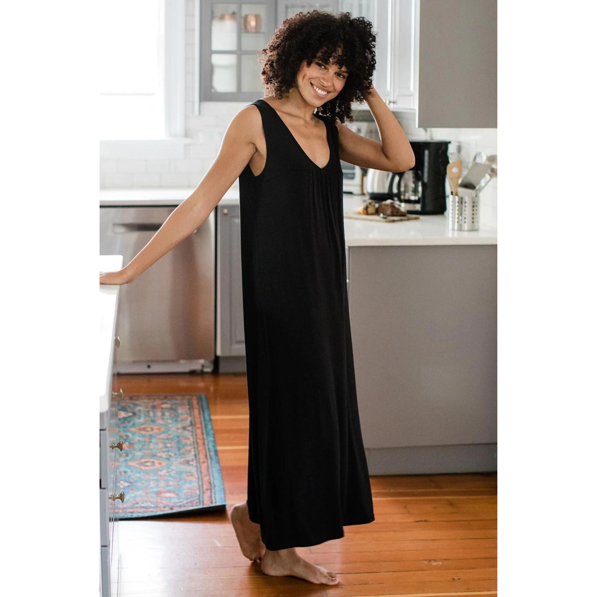 True to all YALA sleepwear, the Molly Nightgown boasts a sensual drape and movement with simple lines. This deep V-neck, sleeveless gown descends to mid-calf. FABRIC: ORGANICALLY GROWN BAMBOO VISCOSE JERSEY Like a second skin, our bamboo viscose jersey provides incredible softness, breathability, and sun protection.  95% Viscose from Bamboo | 5% Spandex Sewn Where Sourced on Small Sewing Floors Low Impact Dyes Oeko-Tex 100 Certified Naturally up to UPF 50 (Ultraviolet Protection Factor)