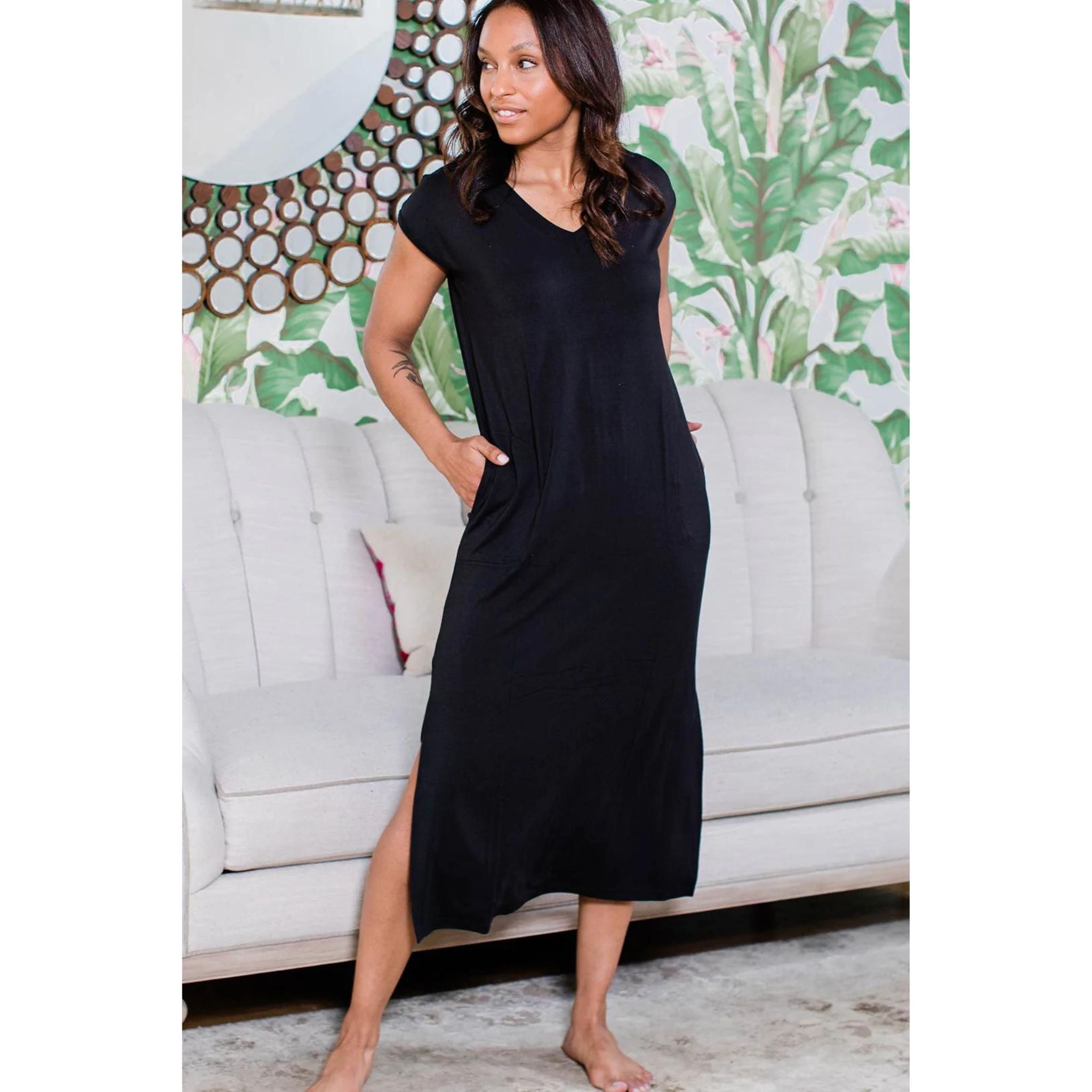 When casual chic comfort calls, the Sloan V-Neck Cap Sleep Bamboo Maxi Dress answers. This loose-fitting t-shirt dress is more flattering than one might expect for its simplicity, or maybe that's the extra radiance you exude from being so wonderfully uninhibited. Chaise lounge optional, but highly recommended. Loose fit, cap sleeve, pockets at hip, V-neck, hem lands at mid-calf.