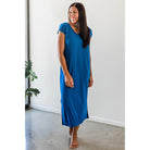 When casual chic comfort calls, the Sloan V-Neck Cap Sleep Bamboo Maxi Dress answers. This loose-fitting t-shirt dress is more flattering than one might expect for its simplicity, or maybe that's the extra radiance you exude from being so wonderfully uninhibited. Chaise lounge optional, but highly recommended. Loose fit, cap sleeve, pockets at hip, V-neck, hem lands at mid-calf.