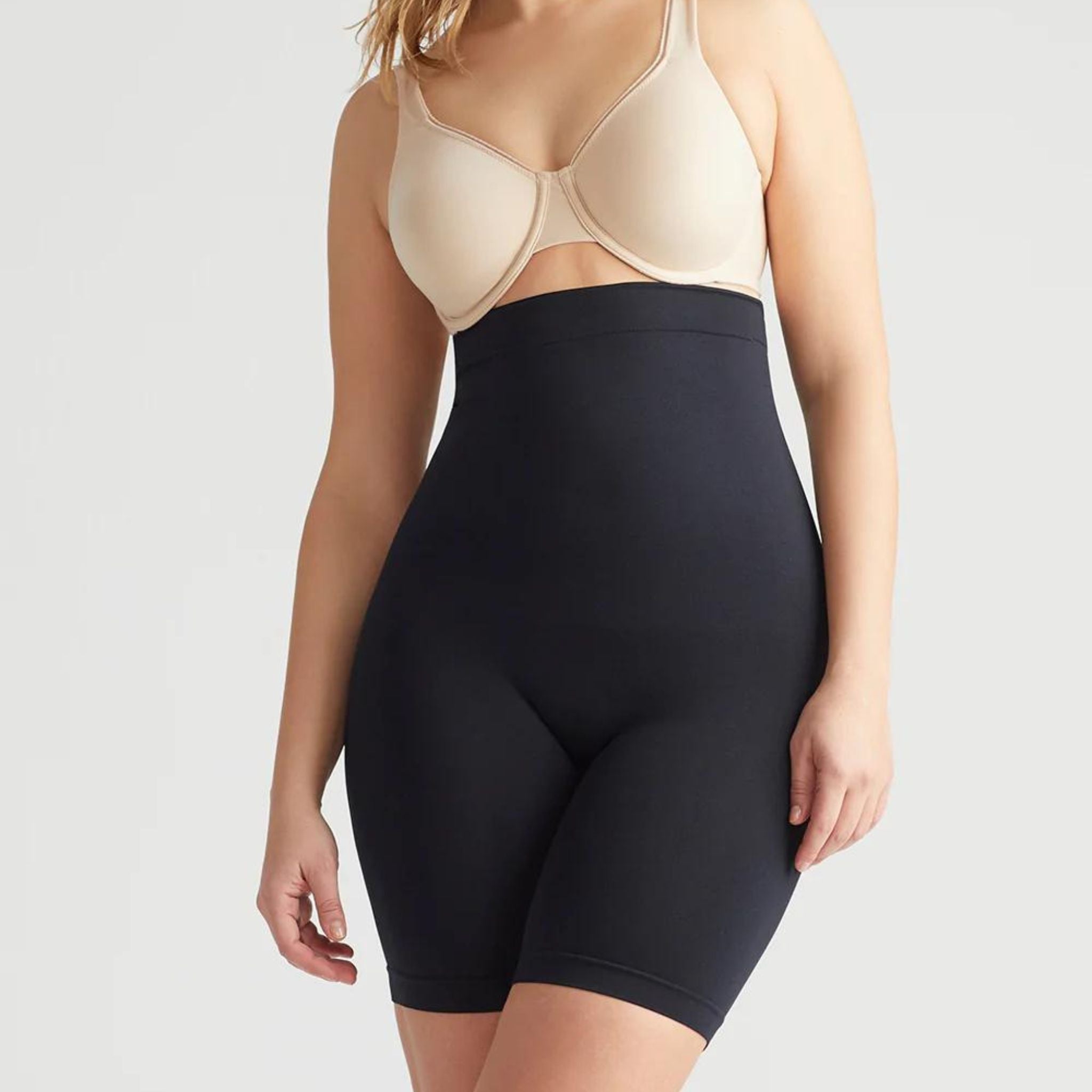 This high waist thigh shaper offers coverage and support through the hips and thighs, plus our Yummie Hug smooths your tummy.  Level 4 firm shaping Targeted waist and thigh shaping Seamless styling gives you complete allover smoothing Smooths and shapes comfortably everyday Soft silicone at waist provides no-slip confidence High-waist design sits just below the bra line