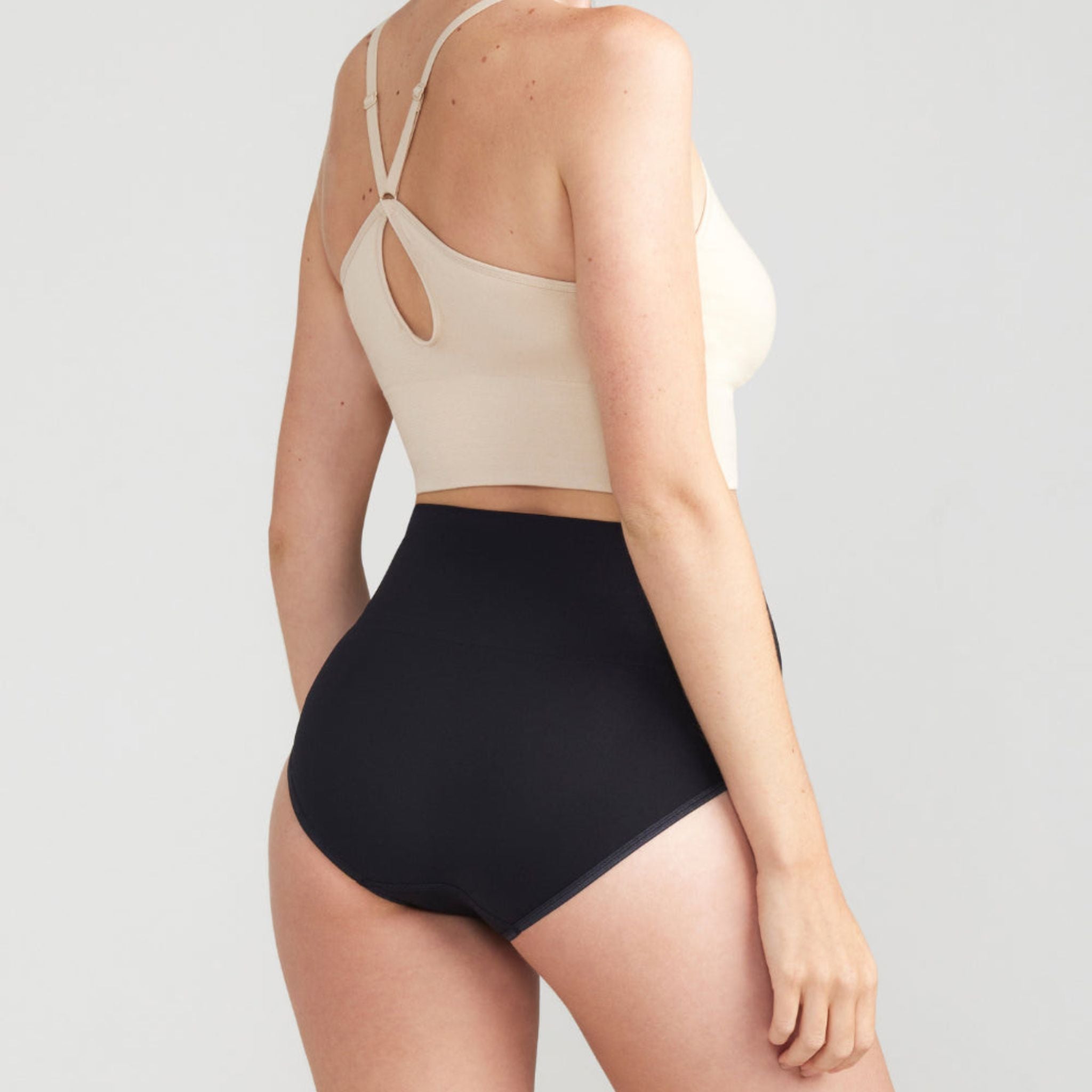 This lightweight nylon shaping brief provides the perfect amount of support with our Yummie Hug.  Level 2 light shaping  Wide 2-ply waistband provides shaping at the tummy  High rise  Comfortable side seam free construction